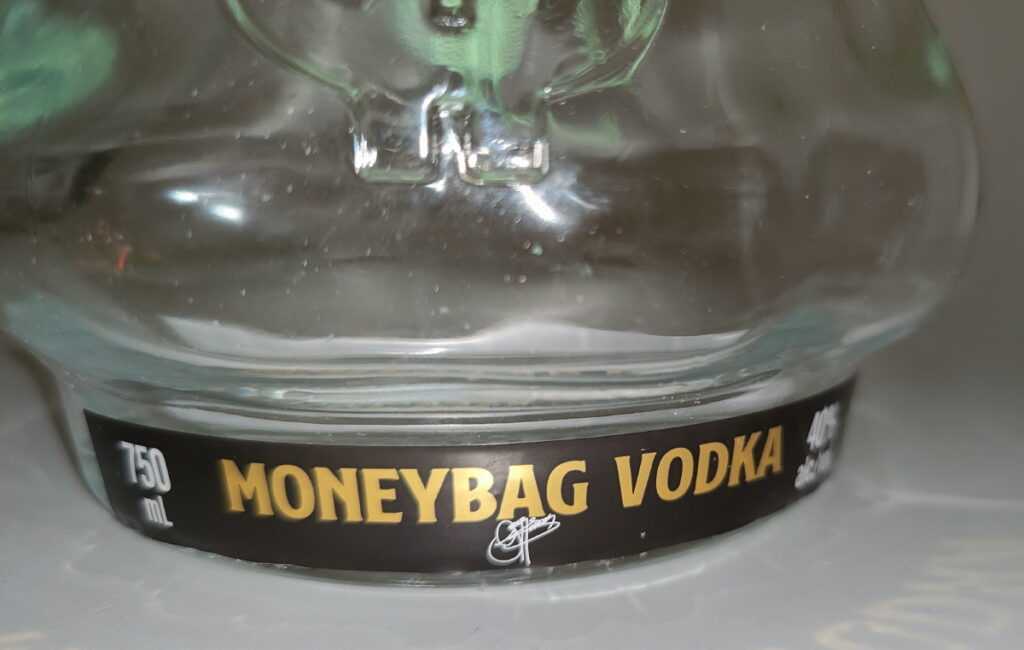 KISS Gene Simmons Moneybag Vodka empty bottle, autographed Eulenspiegel's KISS Collector SHOP