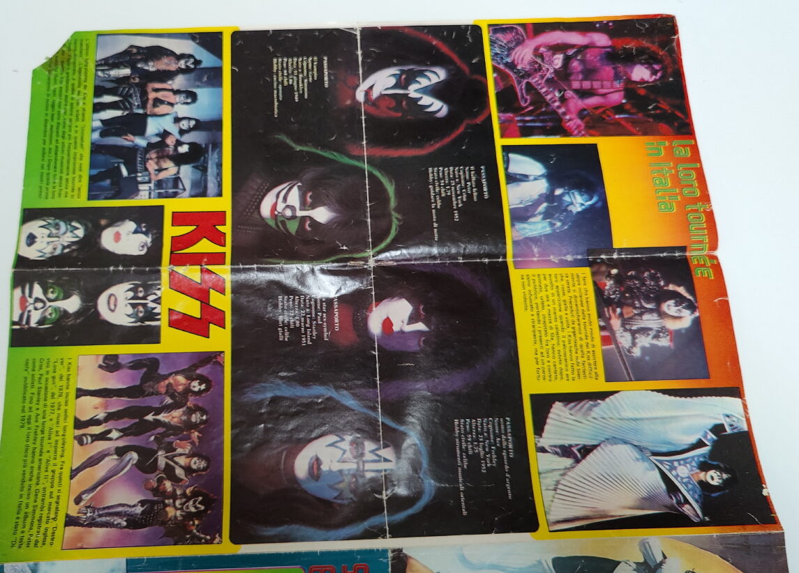 A vintage Kiss magazine poster hints at hidden desires